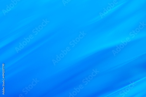 Blue abstract gradient background with lines and blur