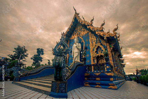 Wat Rong Suea Ten-Chiang Rai:24 September 2021,tmosphere inside the temple,there is an old white Buddha image,tourists from around the world always come to make merit,Rim Kok Subdistrict,Thailand photo