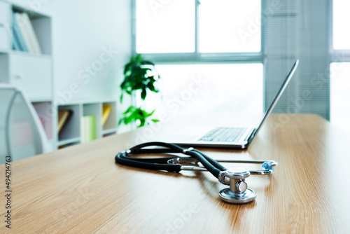 Doctor workplace with a stethoscope at table