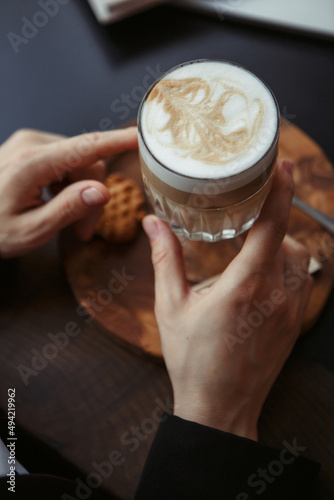 person holding a cup of coffee
