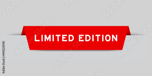 Red color inserted label with word limited edition on gray background