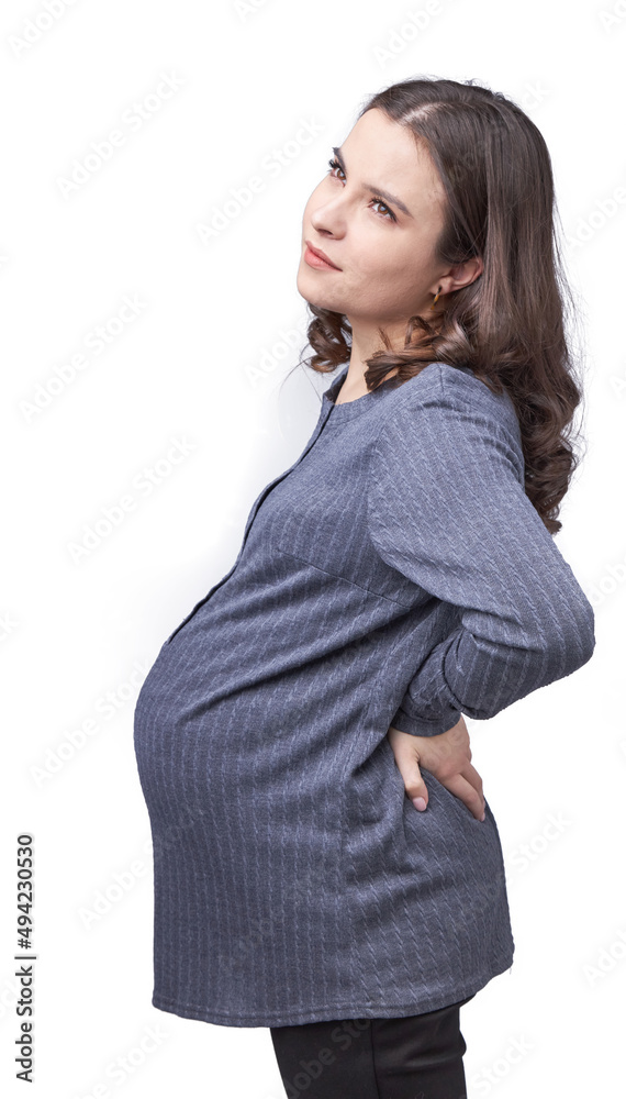 A pregnant young woman experiences abdominal and back pain. A pregnant young woman experiences abdominal and back pain.