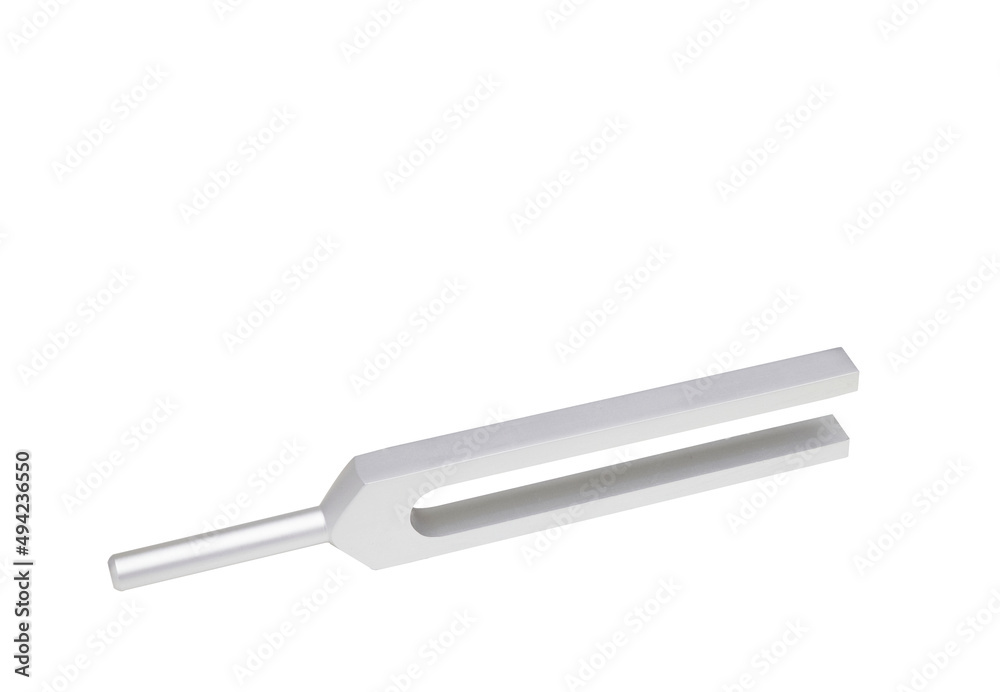 Tuning fork in side up position on isolated white background