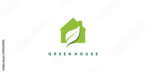 Green house logo design with creative modern concept Premium Vector