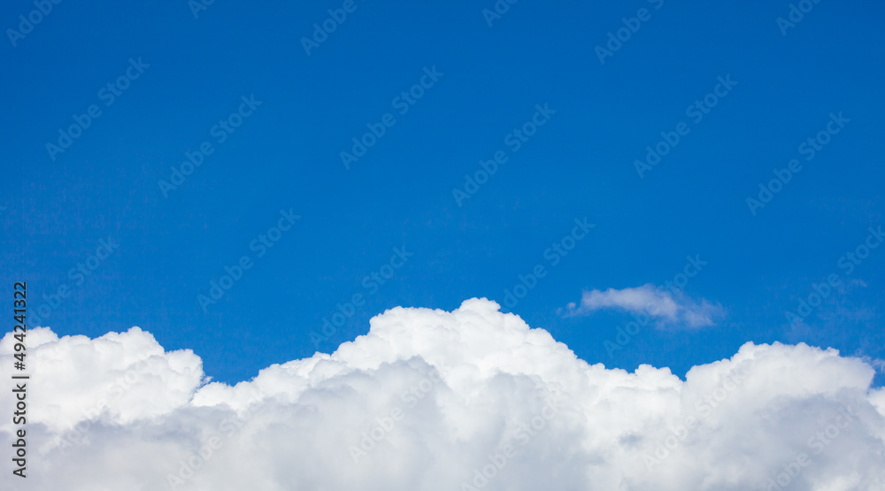 Natural daylight and white clouds floating on blue sky. Concept of freedom and relaxation. Natural daylight and white clouds floating on blue sky. Concept of freedom and relaxation.