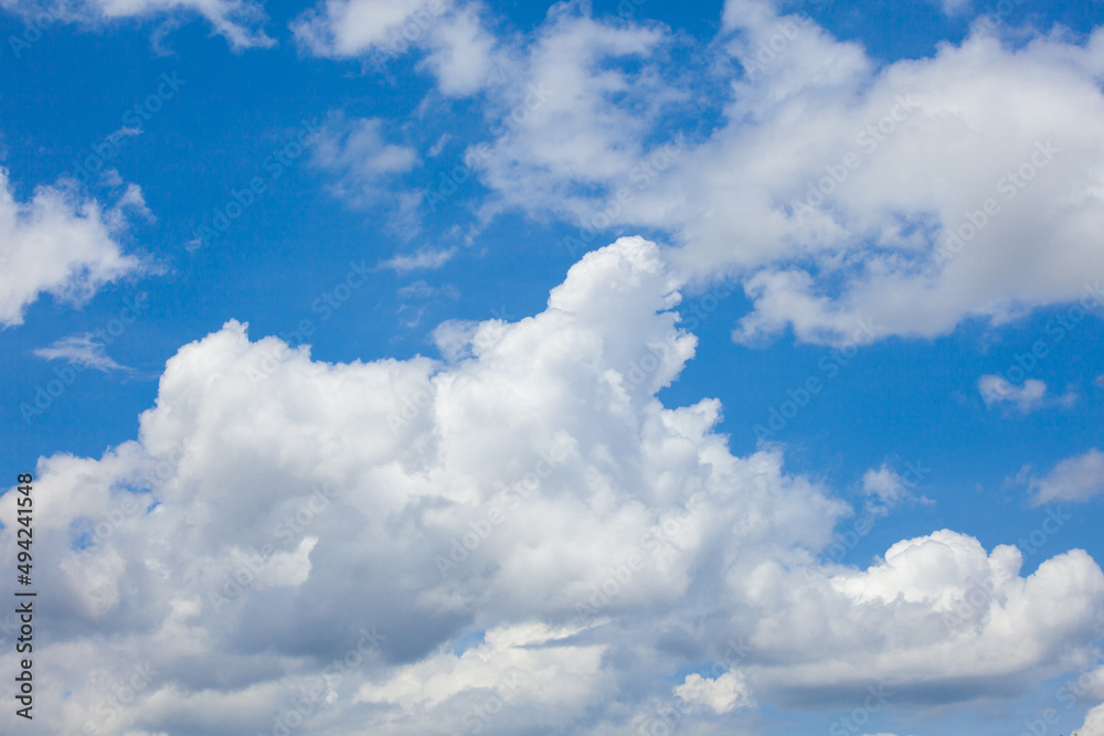 Natural daylight and white clouds floating on blue sky. Concept of freedom and relaxation. Natural daylight and white clouds floating on blue sky. Concept of freedom and relaxation.