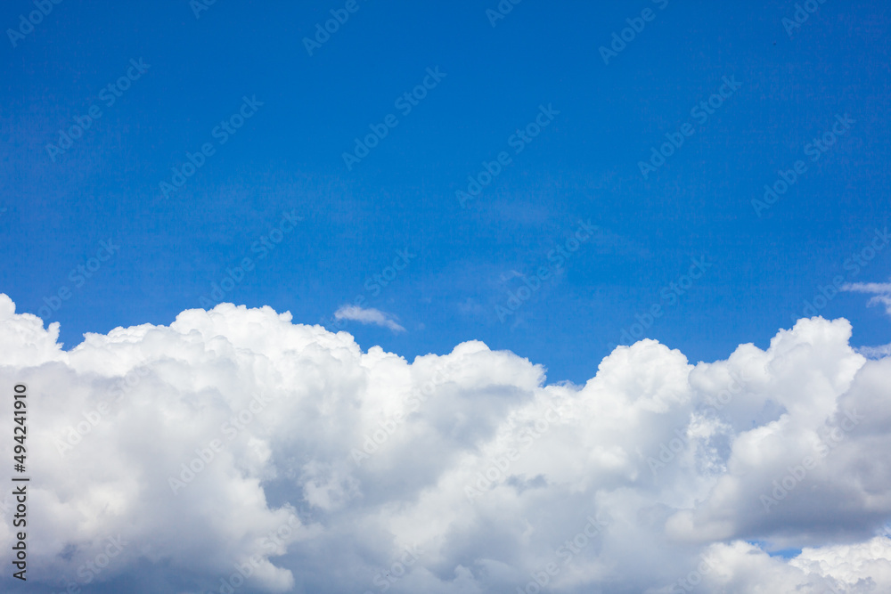 Natural daylight and white clouds floating on blue sky. Concept of freedom and relaxation. Natural daylight and white clouds floating on blue sky. Concept of freedom and relaxation.