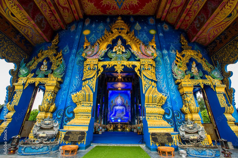 Fototapeta premium Wat Rong Suea Ten-Chiang Rai:24 September 2021,tmosphere inside the temple,there is an old white Buddha image,tourists from around the world always come to make merit,Rim Kok Subdistrict,Thailand