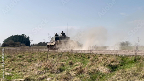 British army FV4034 Challenger 2 main battle tank with Commander and gunner directing, in action on a military exercise © Martin