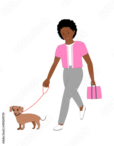 A young black woman walking a Dachshund dog with white background