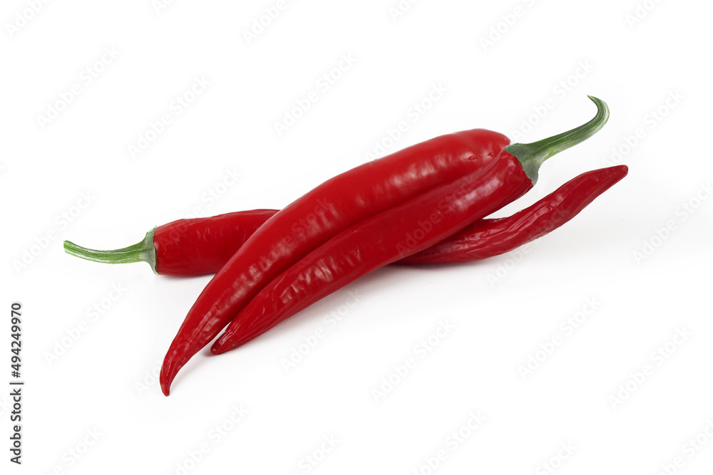 several red hot chili peppers isolated on a white background