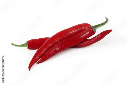 several red hot chili peppers isolated on a white background