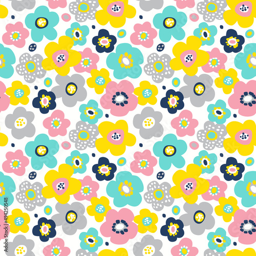 Seamless vector pattern with bright colorful flowers on white background. Modern flowers fabric pattern. Floral pattern for fabrics, textile, wallpapers, etc.