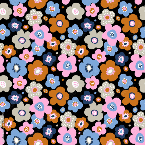 Seamless vector pattern with bright colorful flowers on black background. Stylish and modern floral pattern. Floral pattern for fabrics, textile, wallpapers, etc.