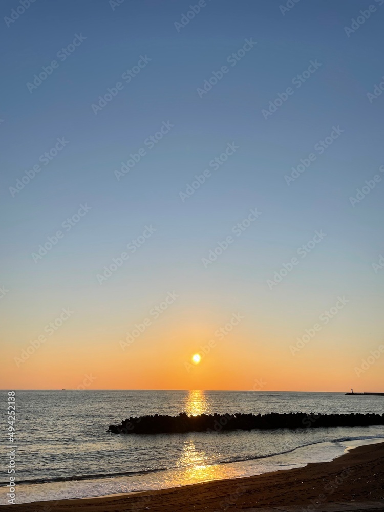 Fototapeta premium sunset on the beach 夕陽