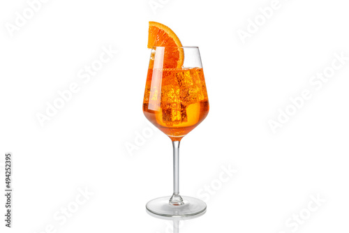 Fototapete Alcoholic Aperol Spritz Cocktail in glass with orange slice, Isolated on White
