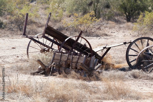 Old broken wagon in the desert