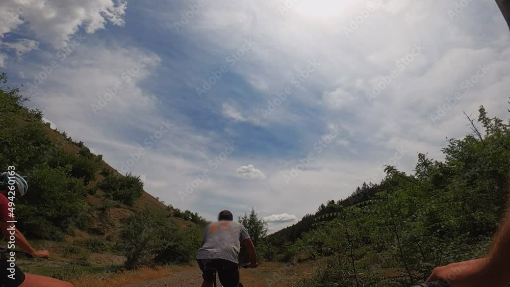 Mountain bicycle fun with friends in summer, slow motion Mountain bicycle fun with friends in summer, slow motion