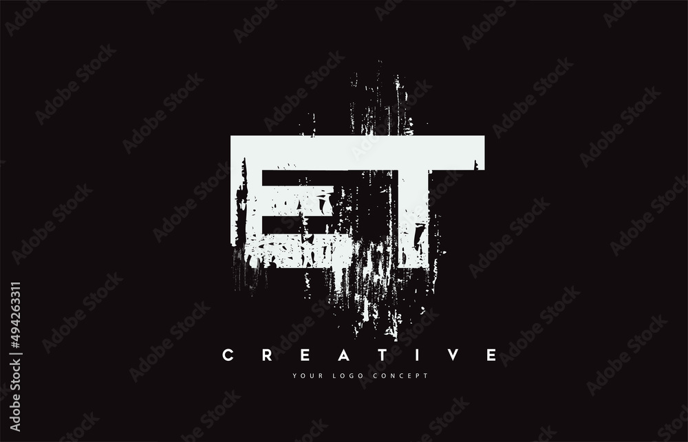 ET E T Grunge Brush Letter Logo Design in White Colors Vector Illustration.