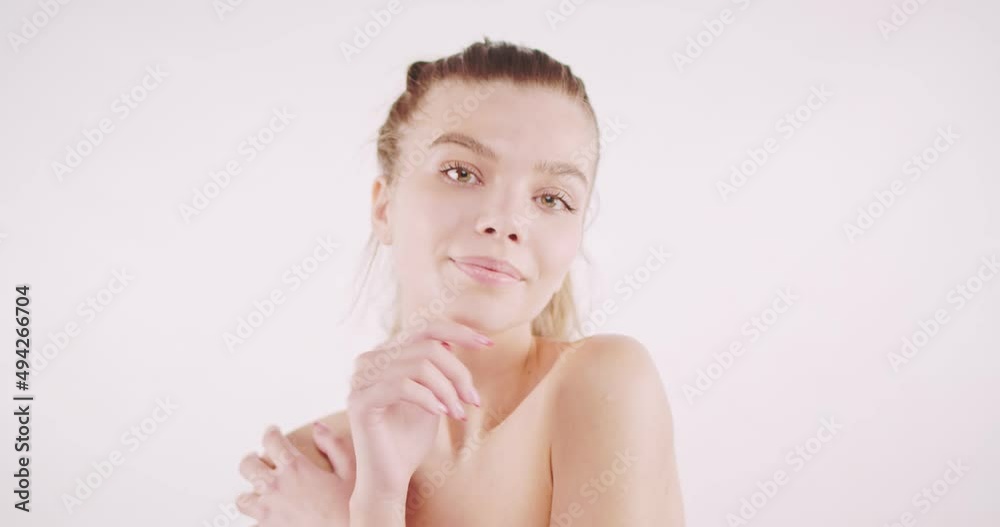 Adorable girl with pure skin applying white cream Adorable girl with pure skin applying white cream
