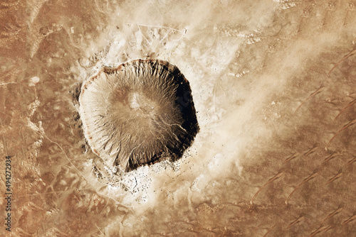 Crater from a meteorite, from space. Elements of this image furnished by NASA photo