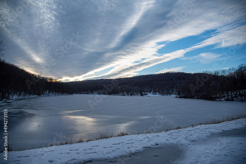 sunset over frozen lake © Sidni