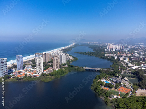 Amazing seaside town in the middle of the mountains with a river flowing - drone aerial view - Barra da Tijuca, Rio de Janeiro, RJ, Brazilian Beach © Rodrigo