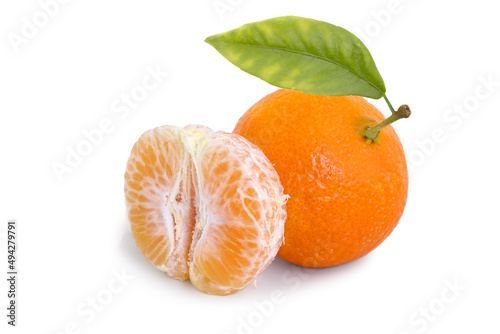 Tangerine and half with leaf isolated on white