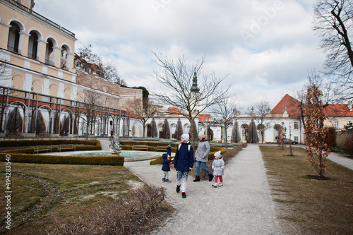 Family walking at historical Mikulov Castle, Moravia, Czech Republic. Old European town.