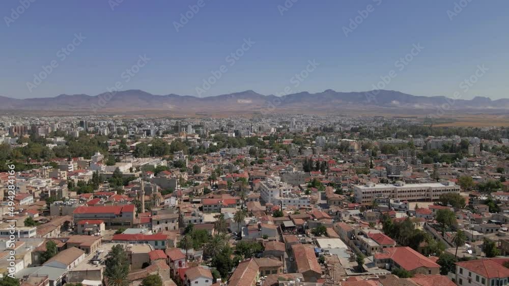 Aerial 4k Nicosia Old Town with Great Inn(Büyük Han), Selimiye Camii(Ayia Sophia Cathedral), Gambler's Inn(Kumarcılar Hanı), First Cypriot Council Houses(Samanbahçe Evleri) in North Cyprus Aerial 4k Nicosia Old Town with Great Inn(Büyük Han), Selimiye Camii(Ayia Sophia Cathedral), Gambler's Inn(Kumarcılar Hanı), First Cypriot Council Houses(Samanbahçe Evleri) in North Cyprus