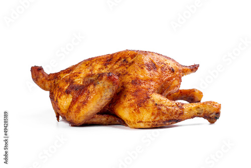 Fresh roasted chicken on white isolated background