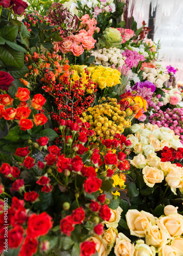 beautiful bright interior of a flower shop in Ukraine with bouquets collected by professional florists © KinoCat