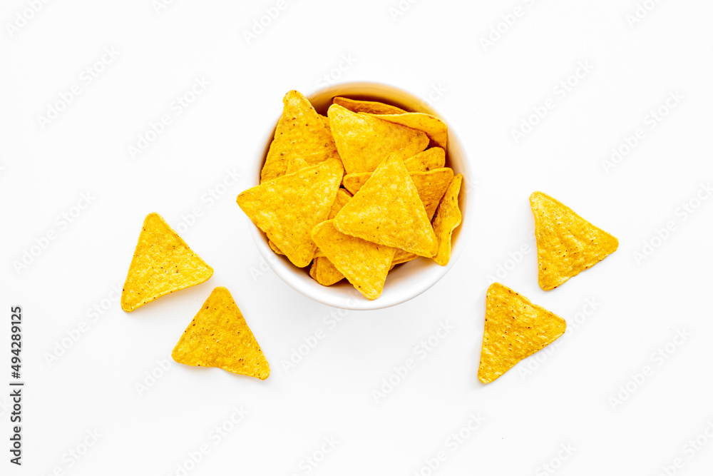 Mexican food nachos chips in bowl top view Mexican food nachos chips in bowl top view