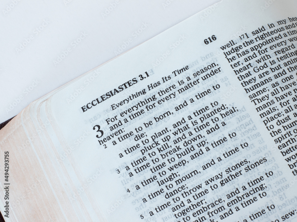 Ecclesiastes Old Testament Bible Book isolated on white background. The Christian biblical concept of time and seasons given by God Jesus Christ. A closeup. Ecclesiastes Old Testament Bible Book isolated on white background. The Christian biblical concept of time and seasons given by God Jesus Christ. A closeup.