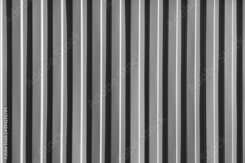Vertical stripes abstract black and white texture background