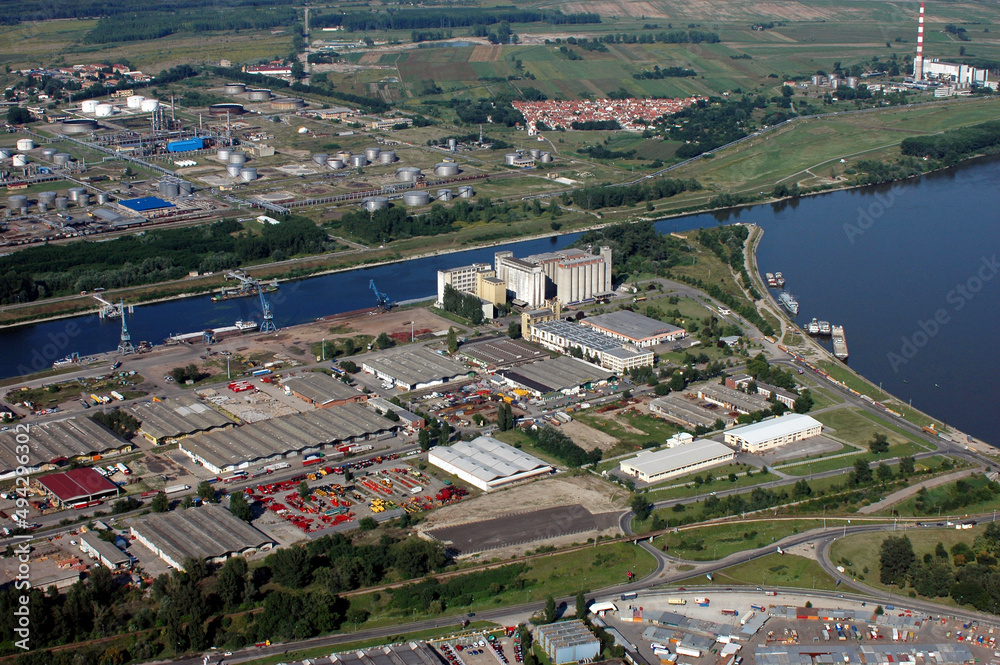 Aerial view of the port, refinery, DTD canal, heating plant and the Danube river in Novi Sad, Serbia