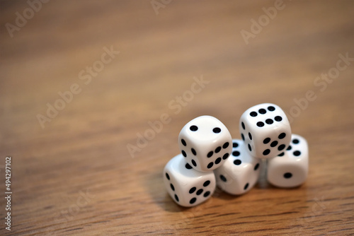 dice on wooden table 