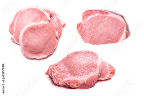 Raw pork pieces isolated on a white background.