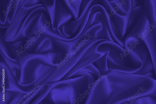 Violet silk or satin luxury fabric texture.