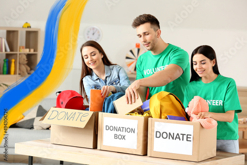 Volunteers putting things i...