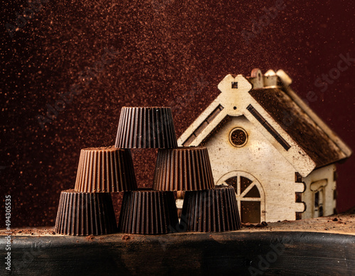 small flavors made of chocolate. old house