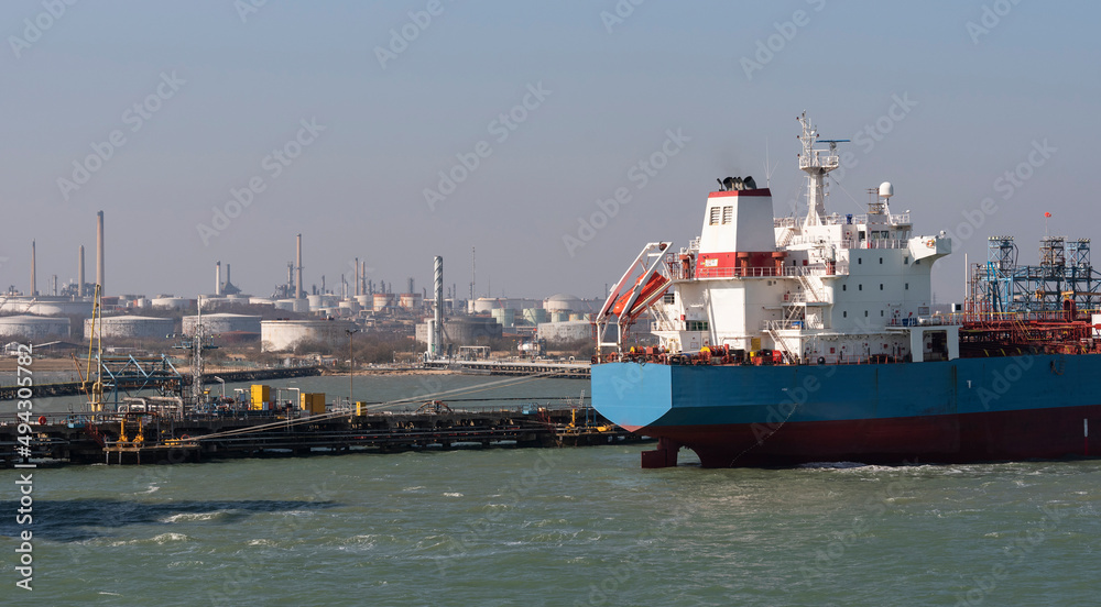Southampton Water, England, UK. 2022.  Chemical oil tanker ship alongside a refinery to offload cargo.