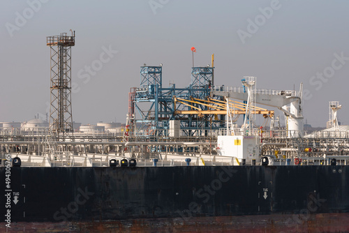 Fawley, Southampton, England, UK. 2022. Chemical oil products tanker ship discharging cargo at Fawley oil refinery on Southampton Water, UK.