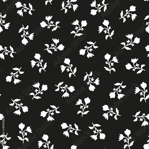 Cute floral seamless repeat pattern. Random placed  monochrome vector flowers with leaves all over print.