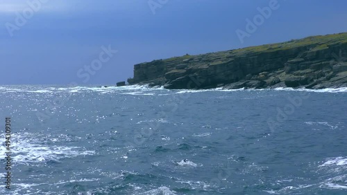 Storm waves crash against the rocky shore. Zmeinyi Island, Black Sea. photo