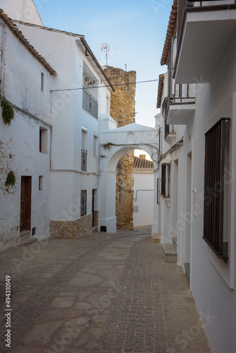 Narrow street in the old town of the famous white village of Setenil de las Bodegas, Cadiz province, Andalusia, Spain © JMDuran Photography