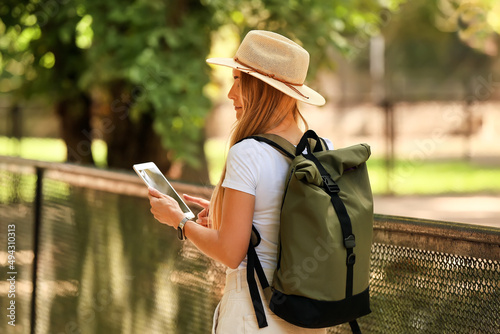 Female tourist with tablet ...