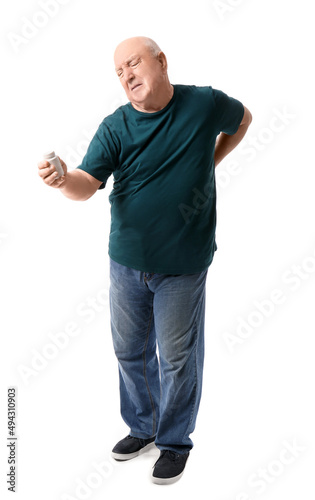 Senior man with bottle of p...