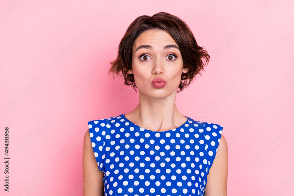 Portrait of cute adorable female pout lips dating boyfriend send air kiss isolated on pastel pink color background Portrait of cute adorable female pout lips dating boyfriend send air kiss isolated on pastel pink color background