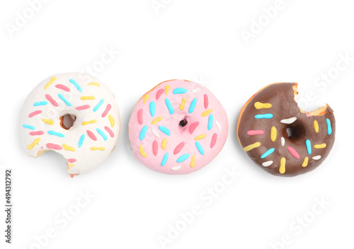 Delicious donuts on white background